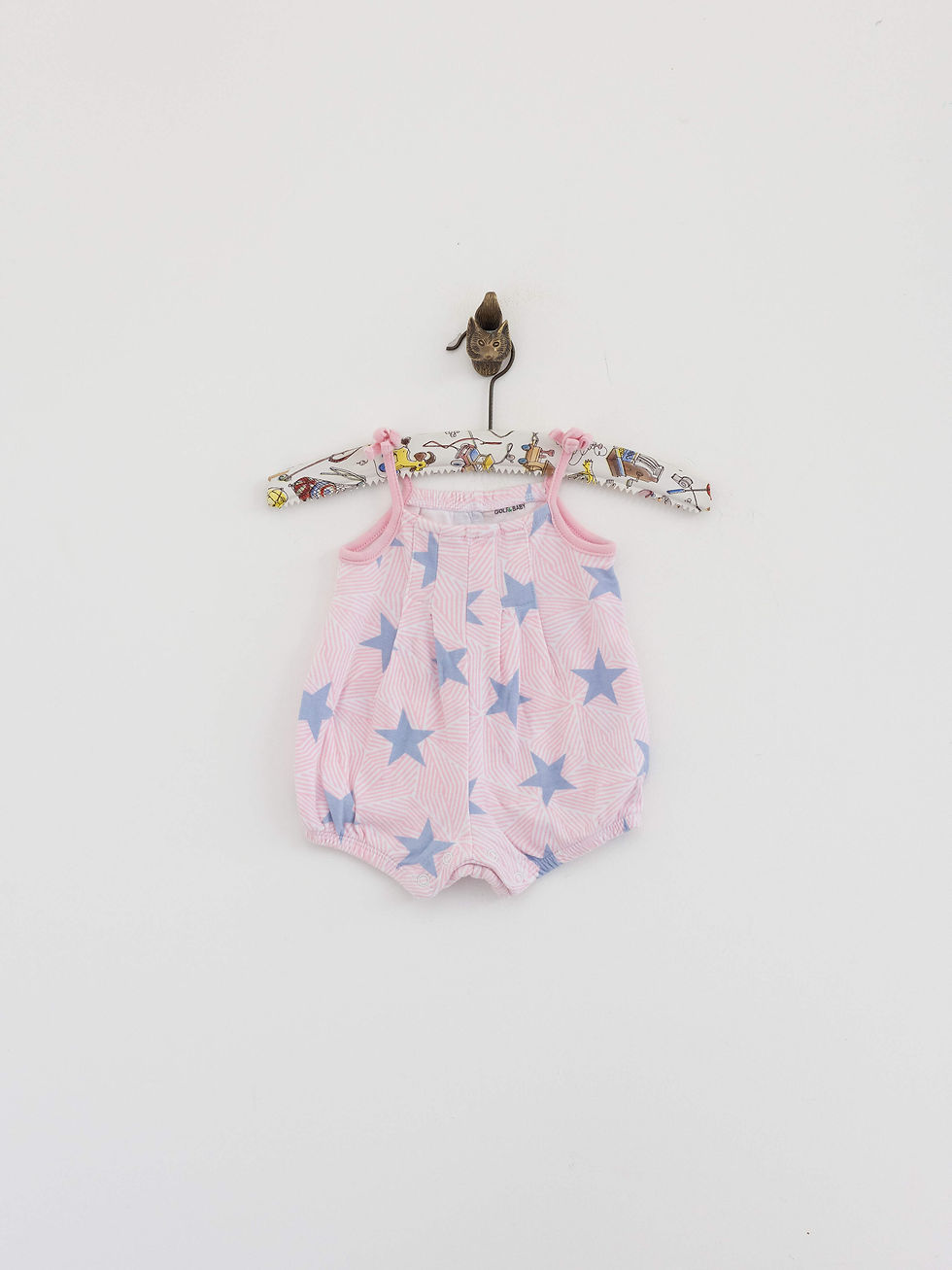 אוברול תינוקת ורוד עם כוכבים כחולים