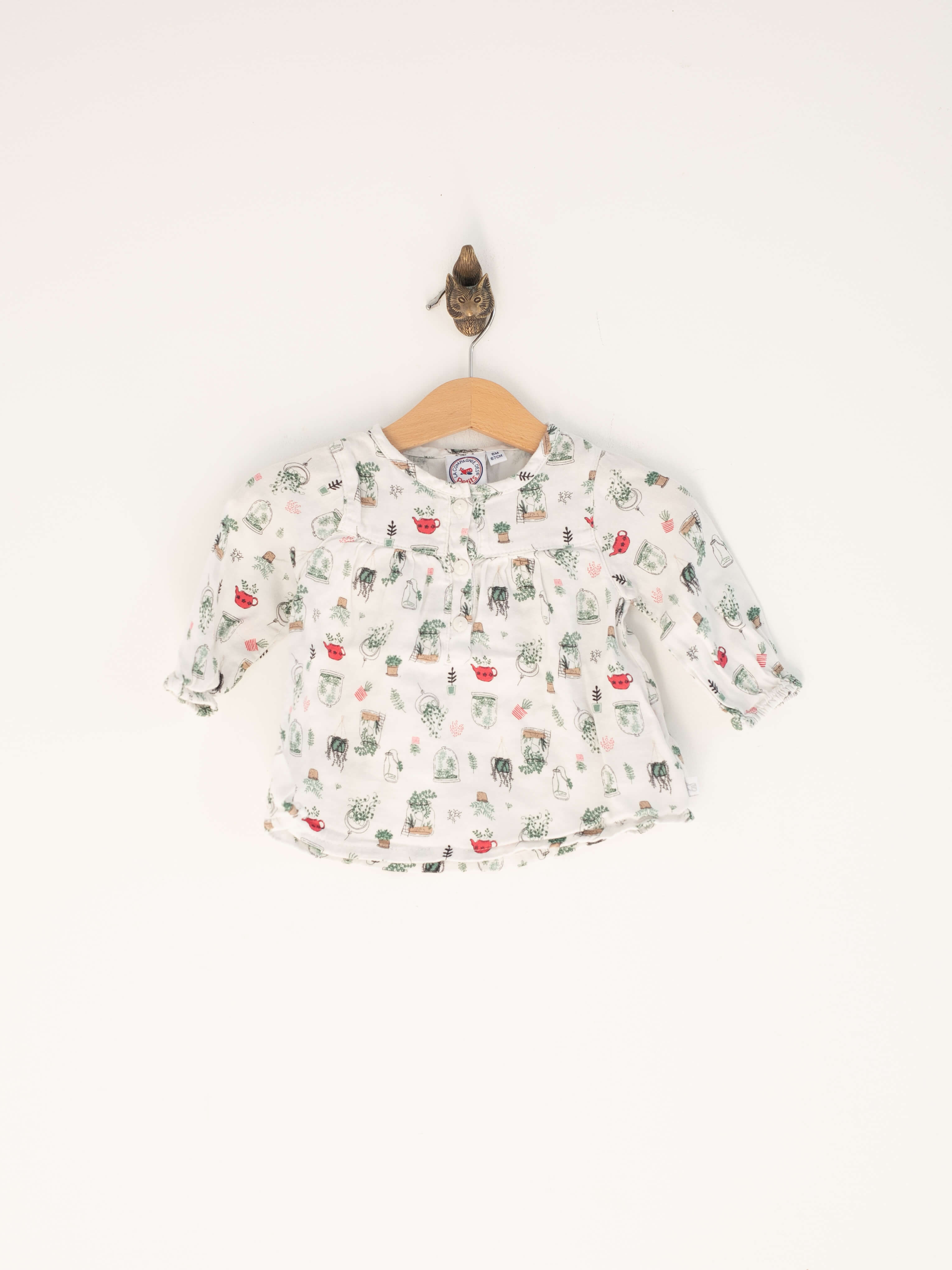 חולצה תינוקת לבנה עם הדפס
