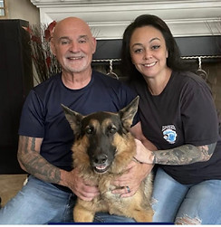 Pawtriotic Pet Hotel owners with Leo the mascot in Murrieta