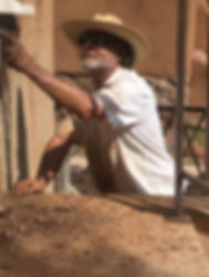 Michael Moquin remudding the front wall.