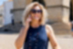Sarah Hampel traveling through Europe while managing her business — living proof that you can make money while traveling.