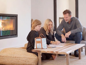 Rachel Krider at home with her daughter and husband