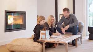 Rachel Krider at home with her daughter and husband