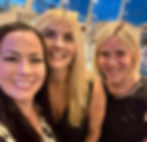 Caroline Hope Light with Lee Anne Haggard and Izabel Coutu, highlighting the power of community and connection within Prosperity Of Life.
