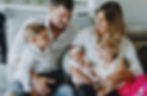 Kristine with her husband Richie and their three children, smiling together as a family.