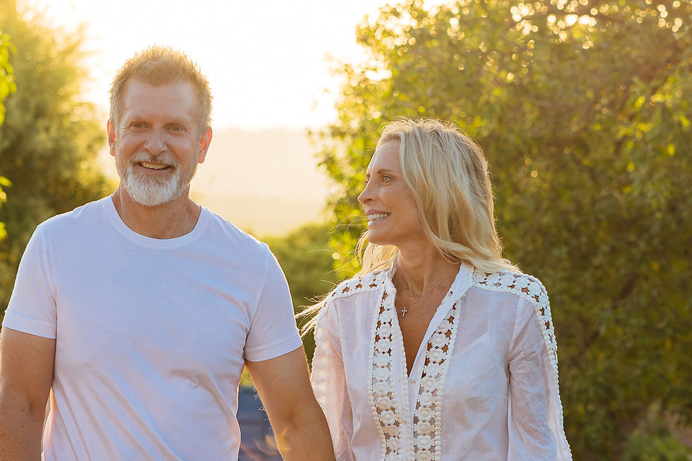 Shane and Rachel Krider at home in their garden, enjoying a lifestyle shaped by abundance, freedom and intention.