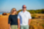 Sarah Hampel and her husband Damian relaxing at the beach, soaking up the sunshine and natural beauty — embodying the Prosperity Of Life lifestyle and how to make money while traveling.