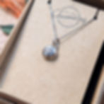 Thumbnail: Mountain Pebble Pendant necklace in recycled sterling silver with chain in packaging