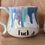 Thumbnail: Flecked stoneware fuck it mug with an drippy blue green and purple glaze