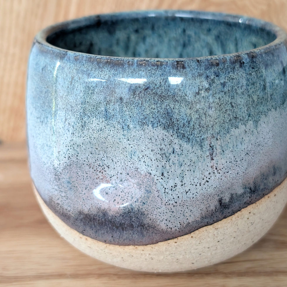 dimpled handleless mug with blue and purple gradient glaze in flat white and latte size