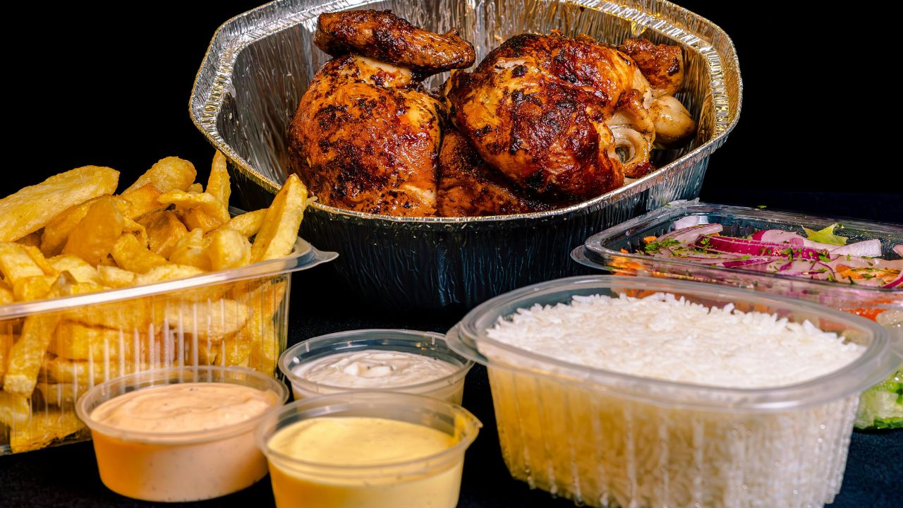 Food truck serving tacos to guests at an outdoor festival