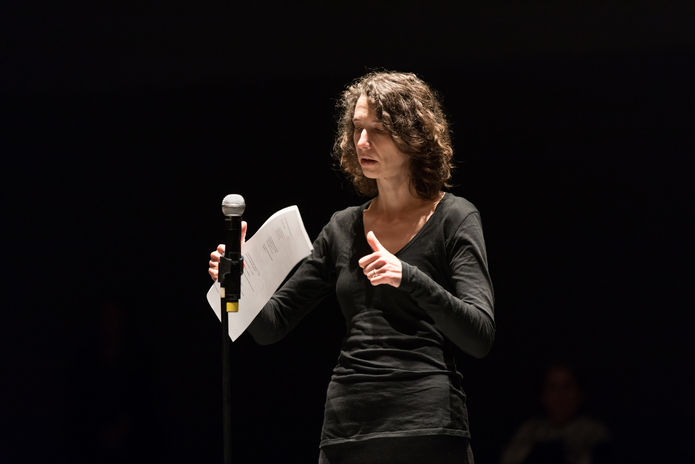 Frances Richard reading and performing "Locus Poem". Photo by Margo Moritz.