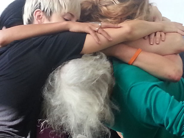 2014 Bridge Project workshop participants doing Simone Forti's Huddle Score