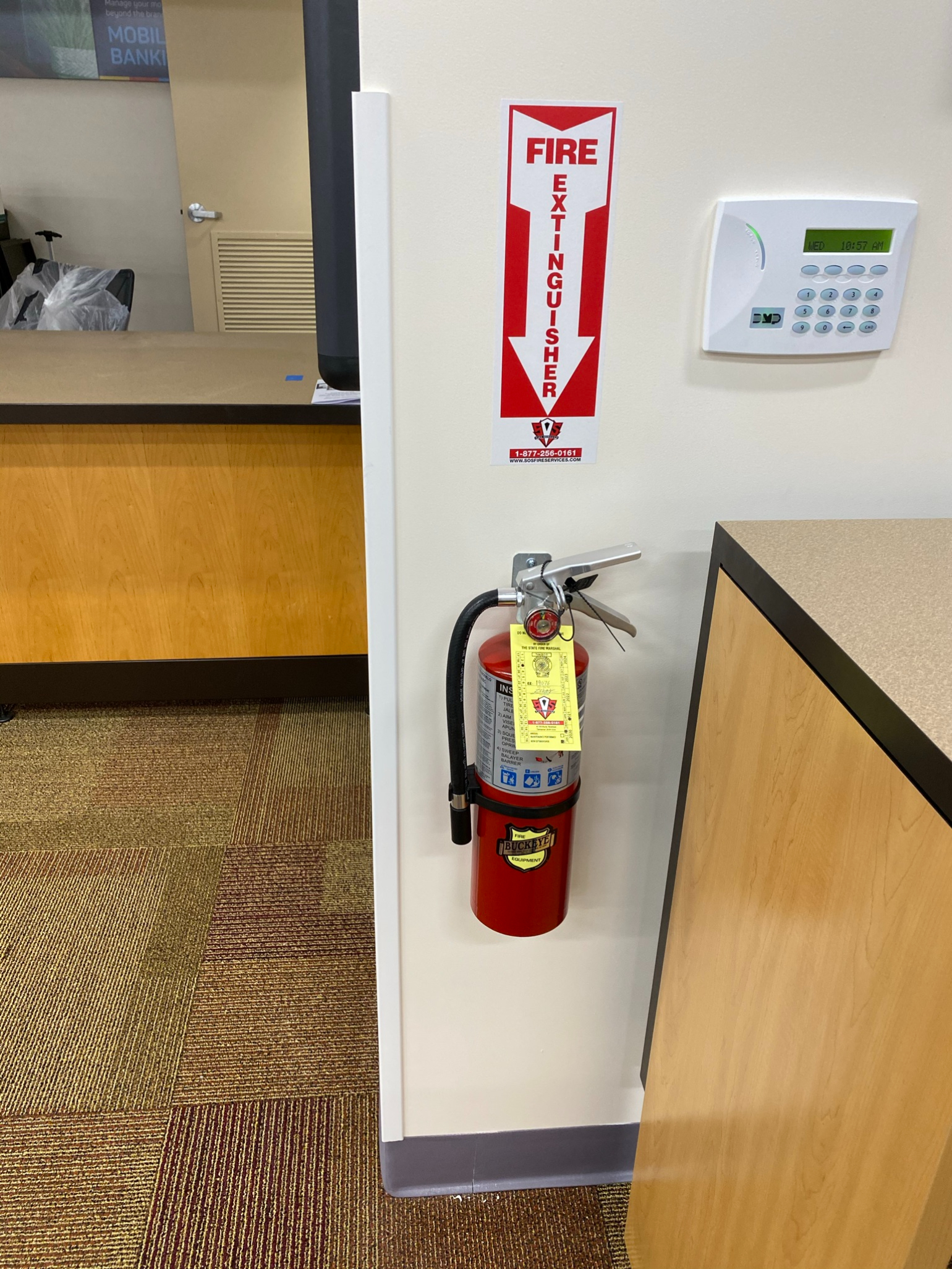 Close-up view of fire extinguisher mounted on wall