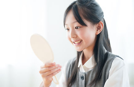 矯