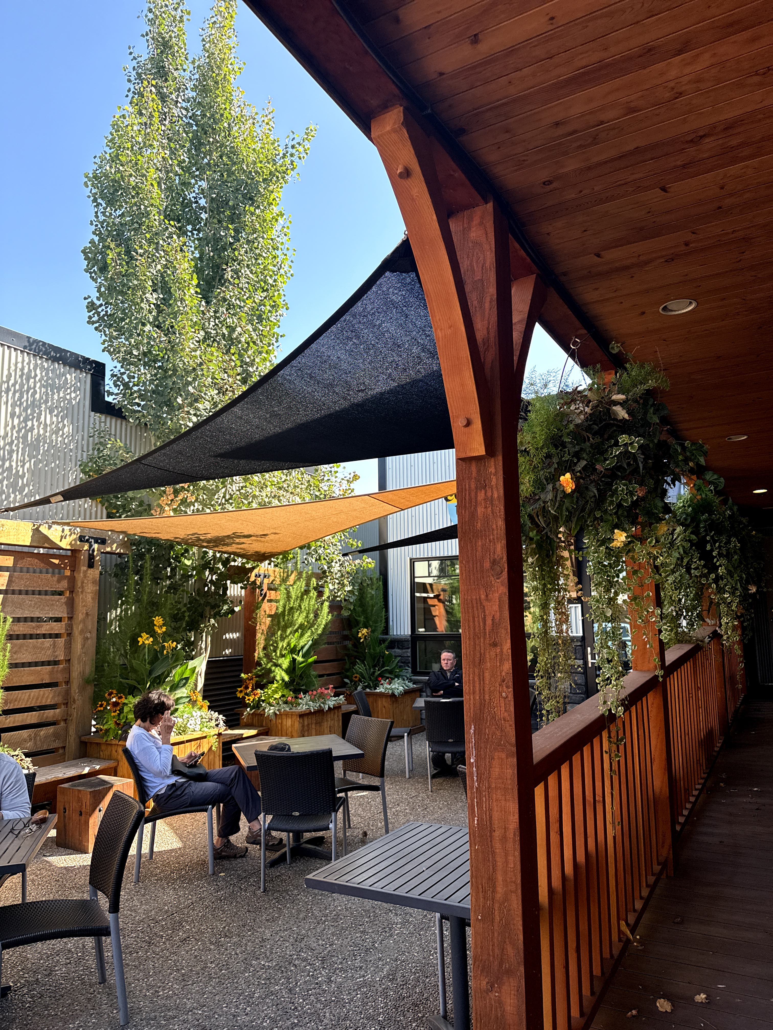 The historic storefront Patio of Cochrane Coffee Traders on 2nd Ave West.