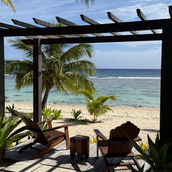 The gazebo with Beachfront chairs position to watch the lagoon