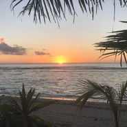 Vivid orange sunset over the calm lagoon