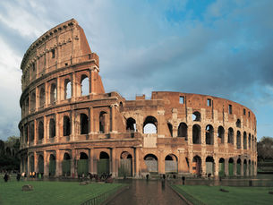 The colosseum under the blue sky in Rome
