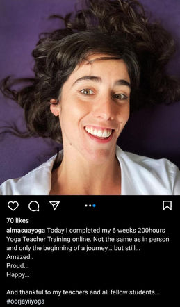 Happy woman wearing white clothes celebrating on Instagram platform the 200hrs yoga teacher training program online  