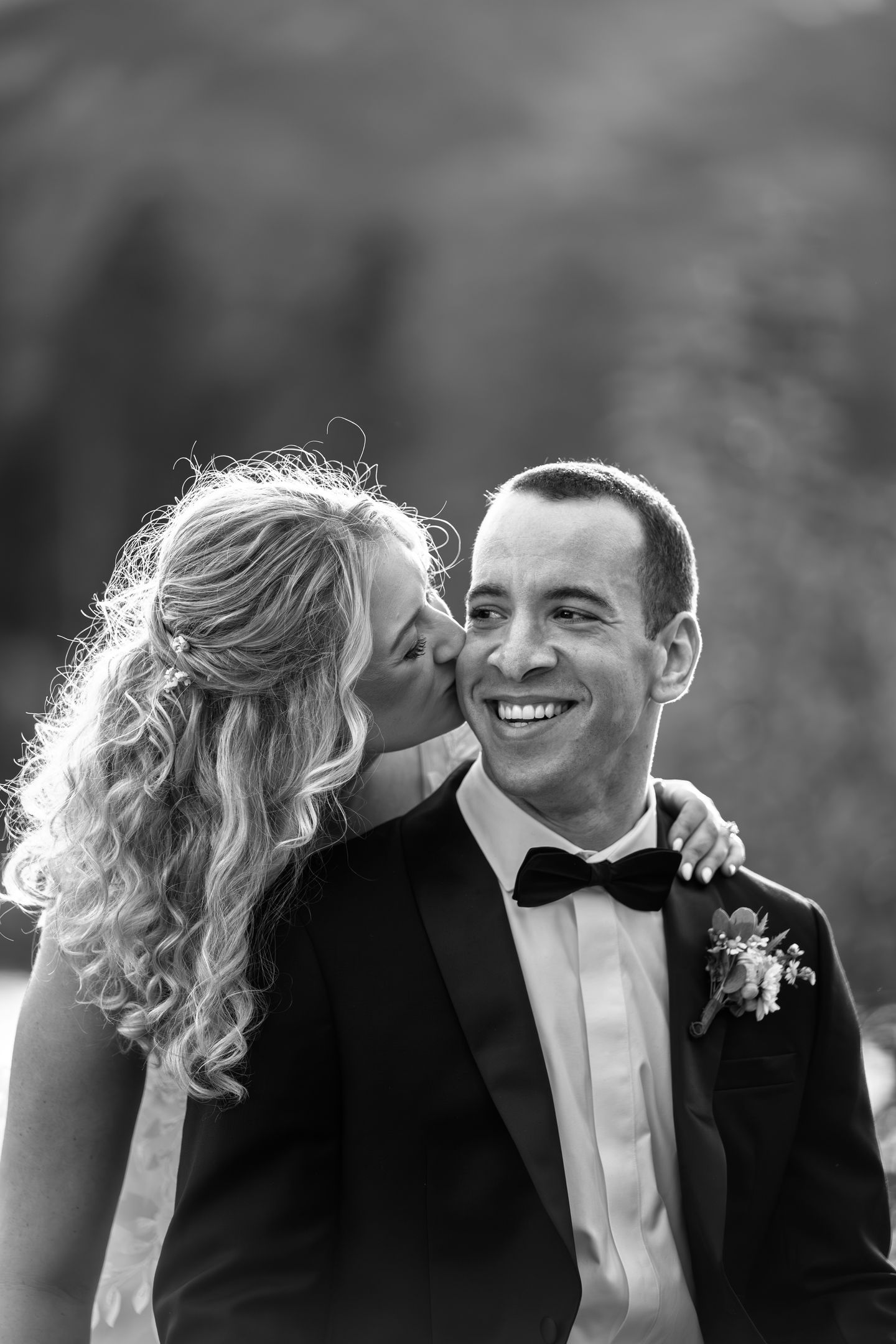 Black and white photo of a couple embracing.