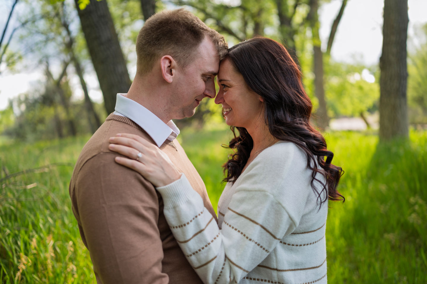 a man and a woman are looking into each other 's eyes