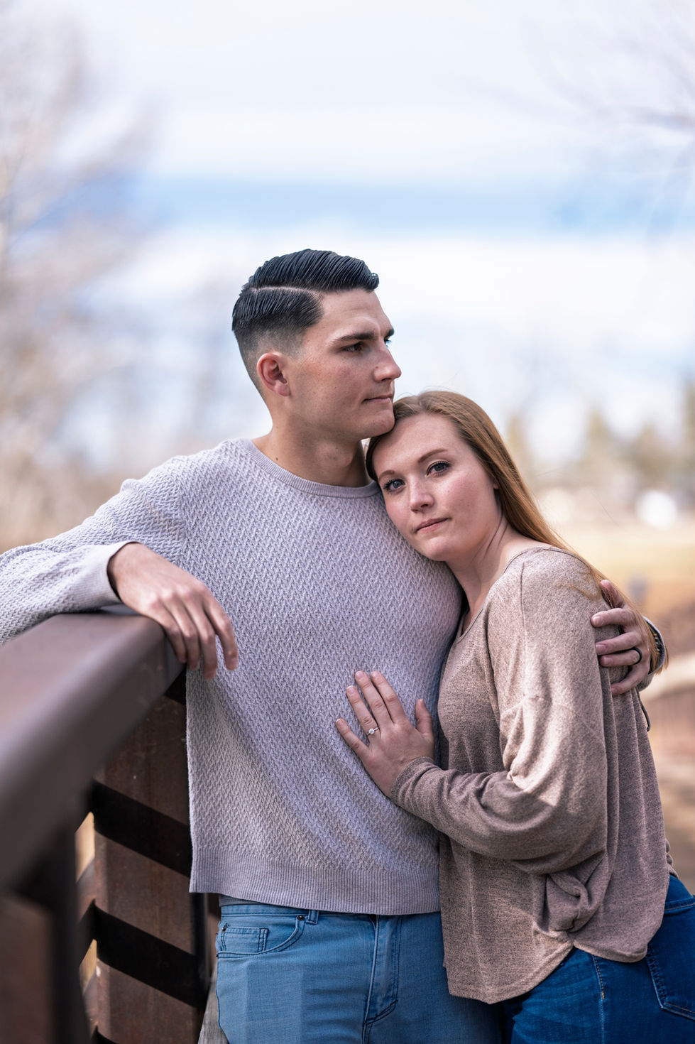 a man and a woman are posing for a picture