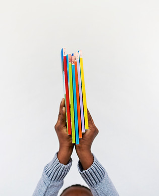 kid with books.jpg