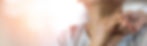 elderly-woman-peach-background.jpeg