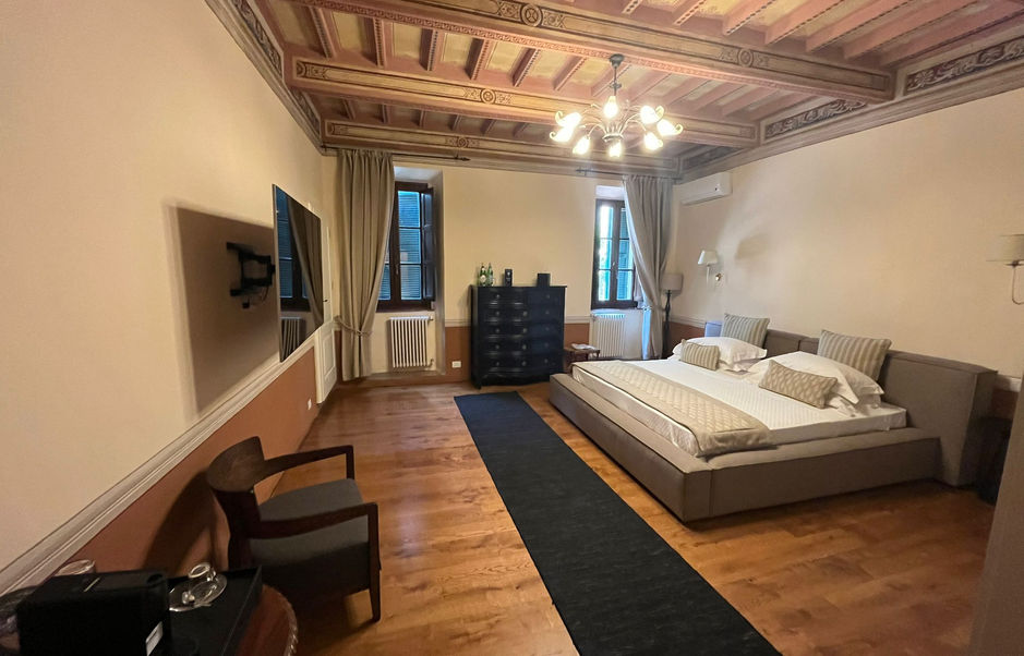 Afresco Room of the Cesira Guesthouse in Montalcino, Italy 
