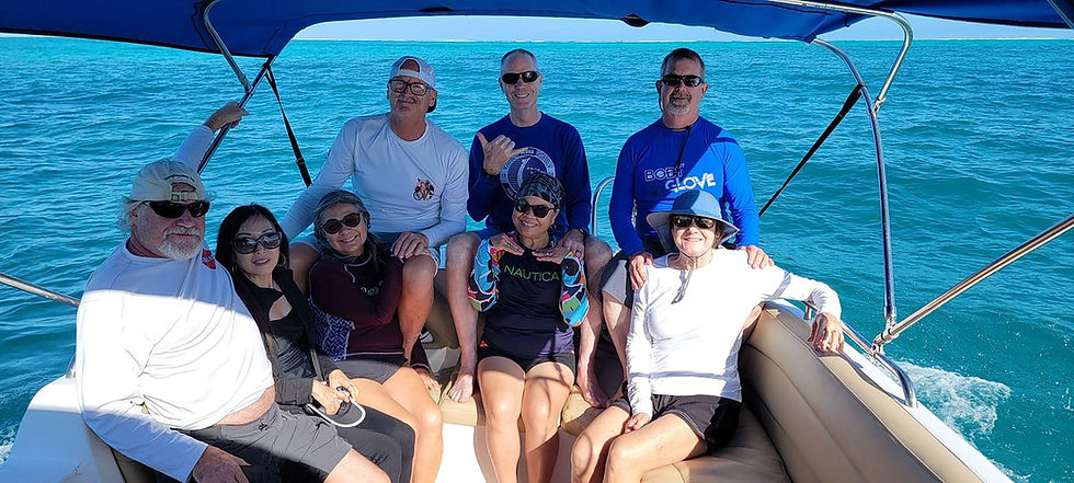 Group photo on a Grace Bay Adventures boat trip during a beautiful family vacation in Turks and Caicos.