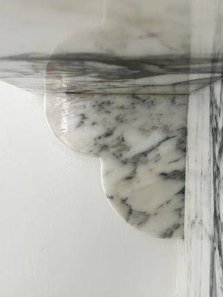 A curved marble end piece.