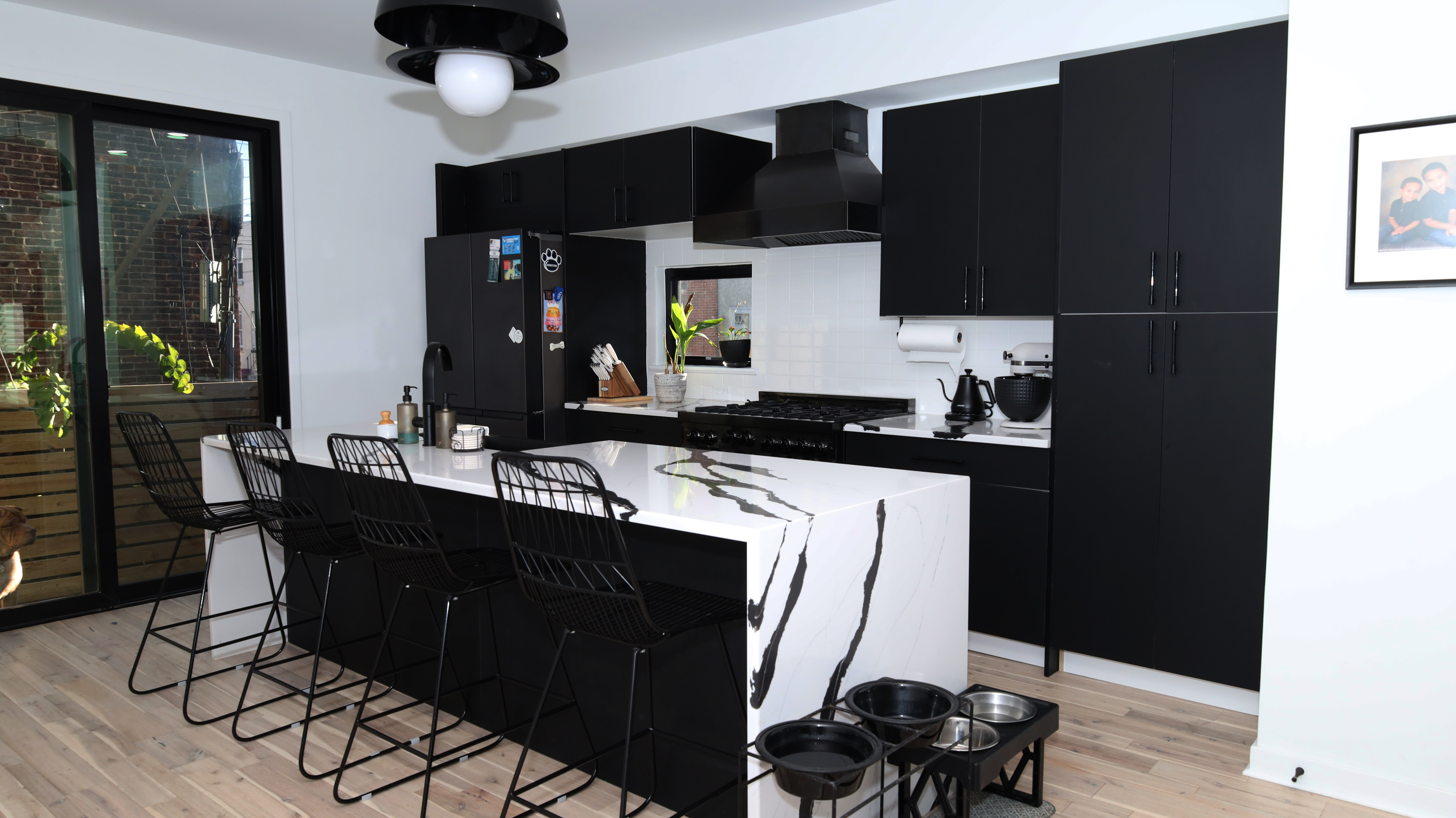 Custom black kitchen in East Kensington