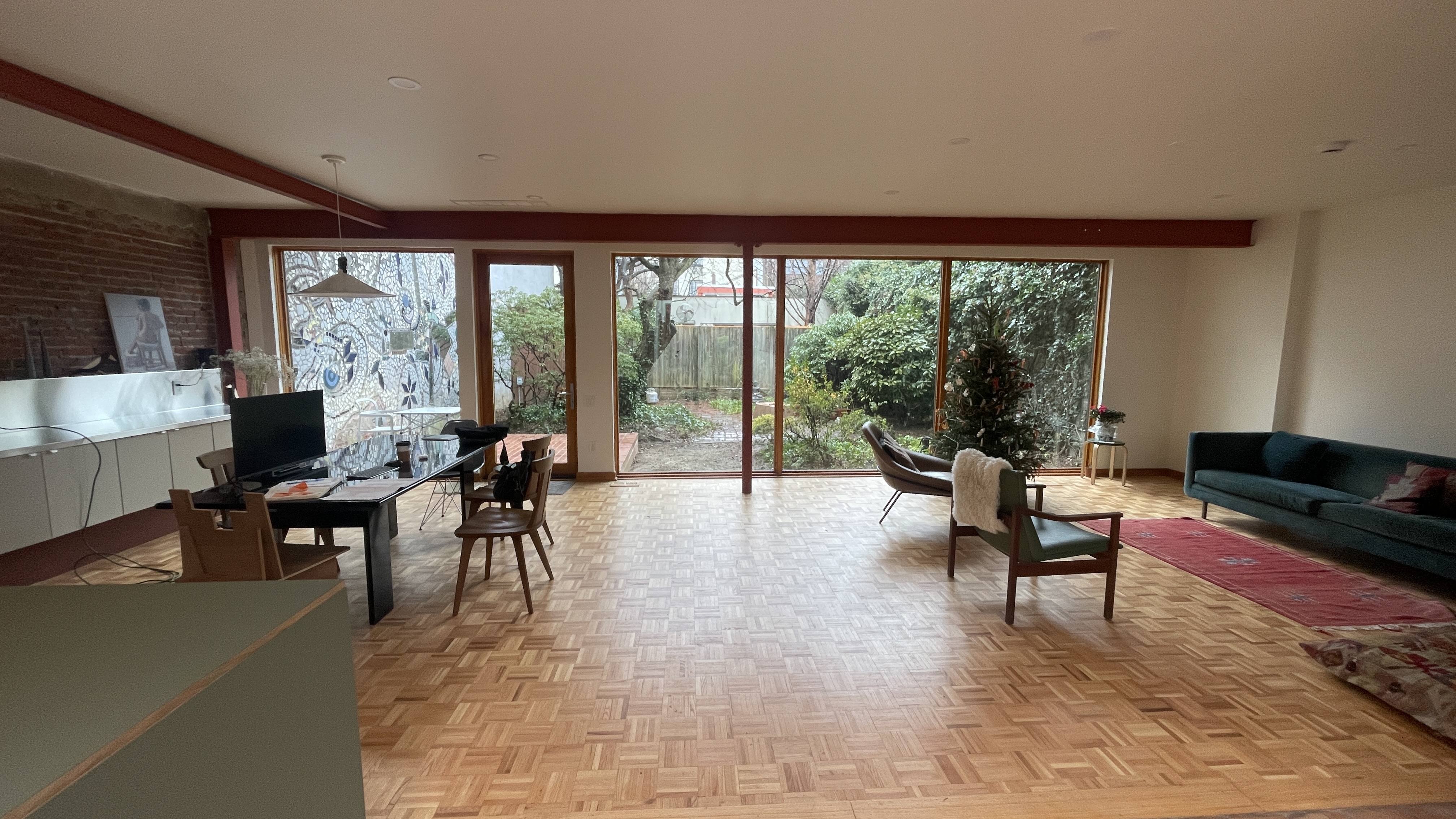 Open living space with new flooring and garden light