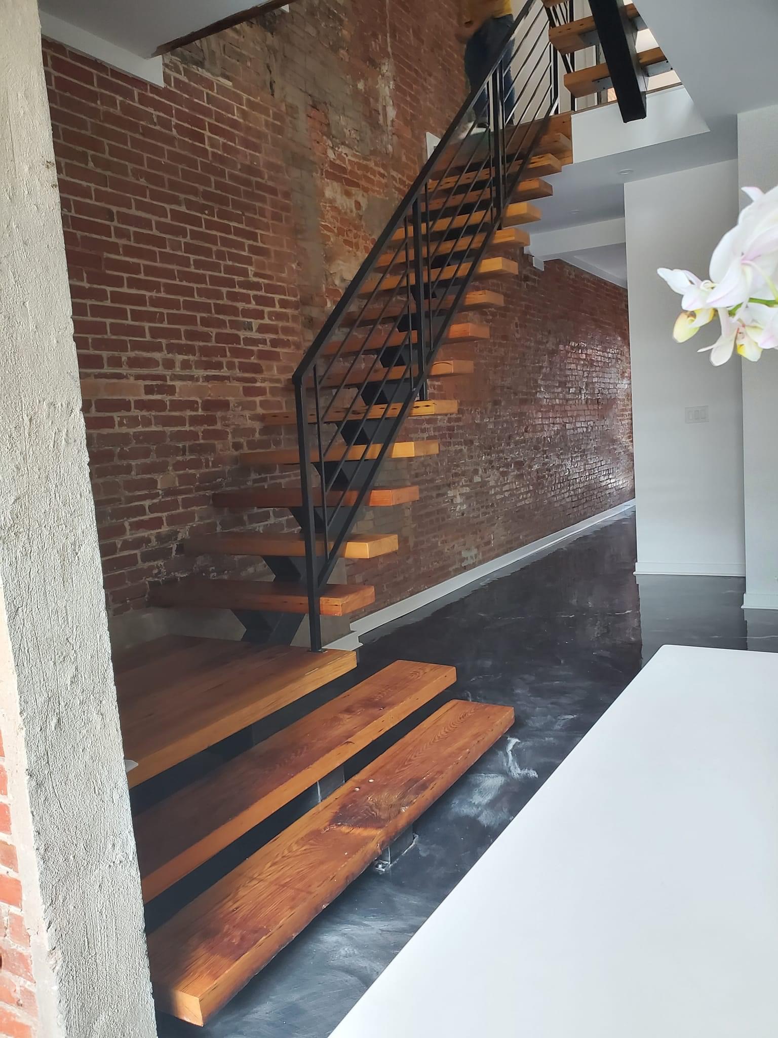 Custom floating stairs with wood treads