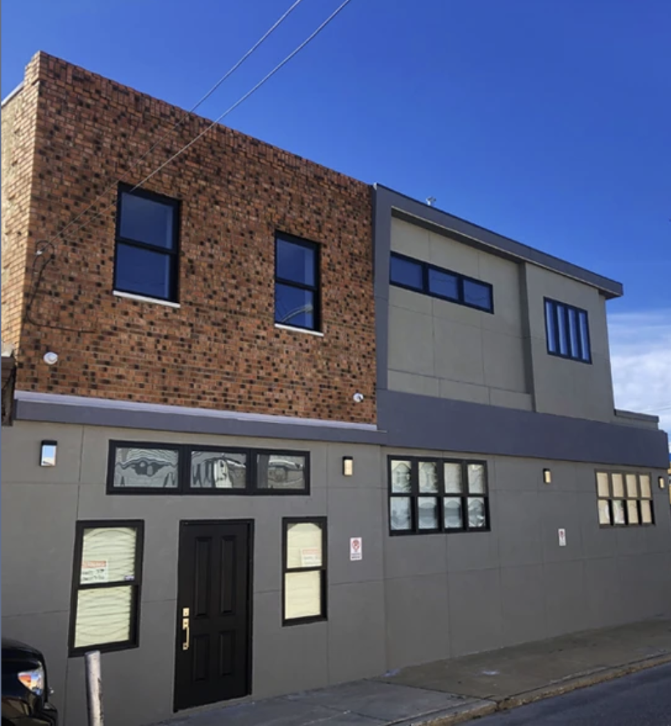 Rehabbed home with addition and new facade in Port Richmond