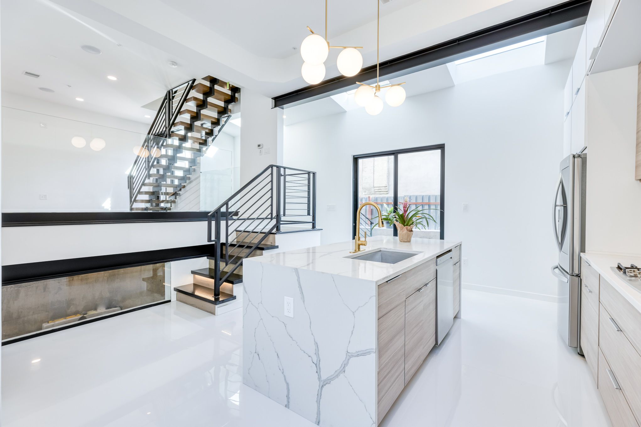 Marble kitchen with custom cabinetry in Kensington