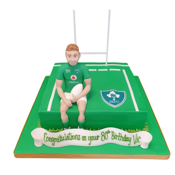 Rugby player-themed cake with Ireland motif, perfect for sports lovers and celebrations. Vibrant design on a 10-inch cake ideal for special occasions.