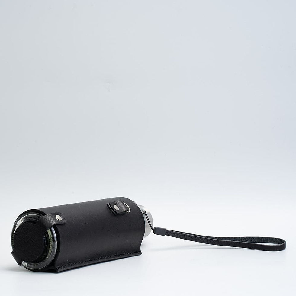 Thumbnail: Leather water bottle holder with strap and glass bottle
