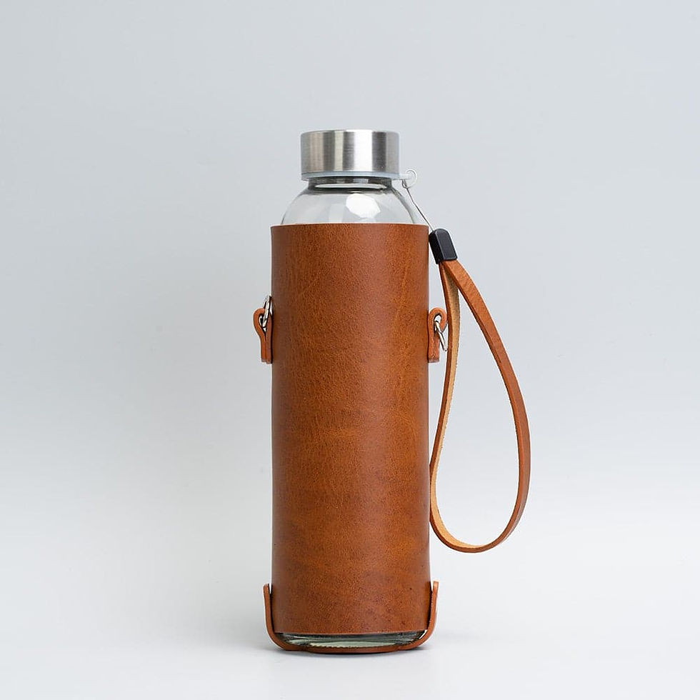 Thumbnail: Leather water bottle holder with strap and glass bottle