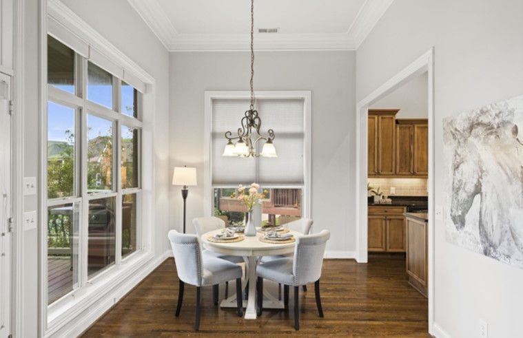 A dining room looks out at the 9th hole on Fairvue Plantation's golf course. 