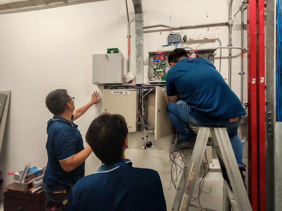 ELID engineers installing an integrated access control system at a commercial site in Selangor