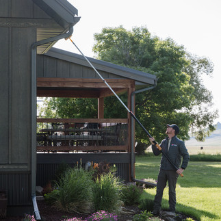 Man cleaning a rooftop