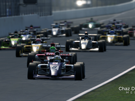 Formula racing cars coming towards the camera