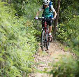 cross-country-biking-woman-cycling-in-th