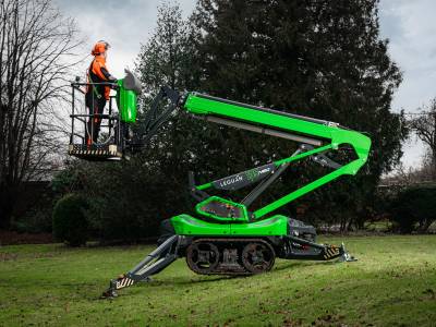 man standing on heavy equipment