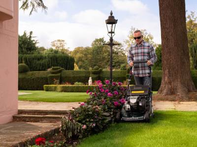 Man with lawnmower