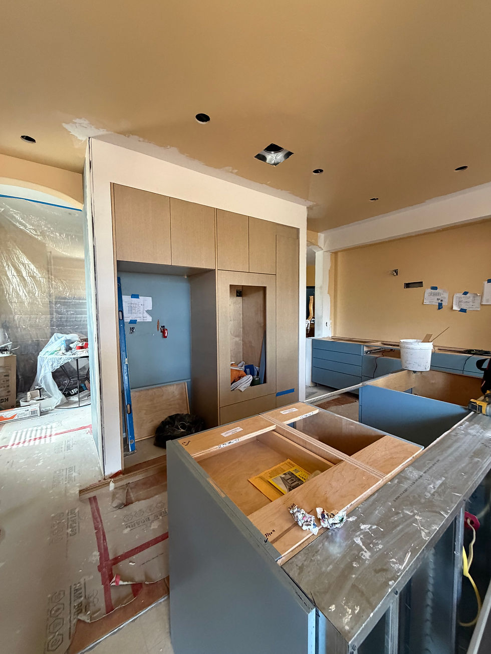 view of refer and double oven wall under construction