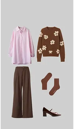Flat-lay of a soft pink button-down shirt paired with a brown floral knit sweater, wide-leg brown trousers, brown socks, and brown Mary Jane heels, styled as a cozy minimalist fall outfit.
