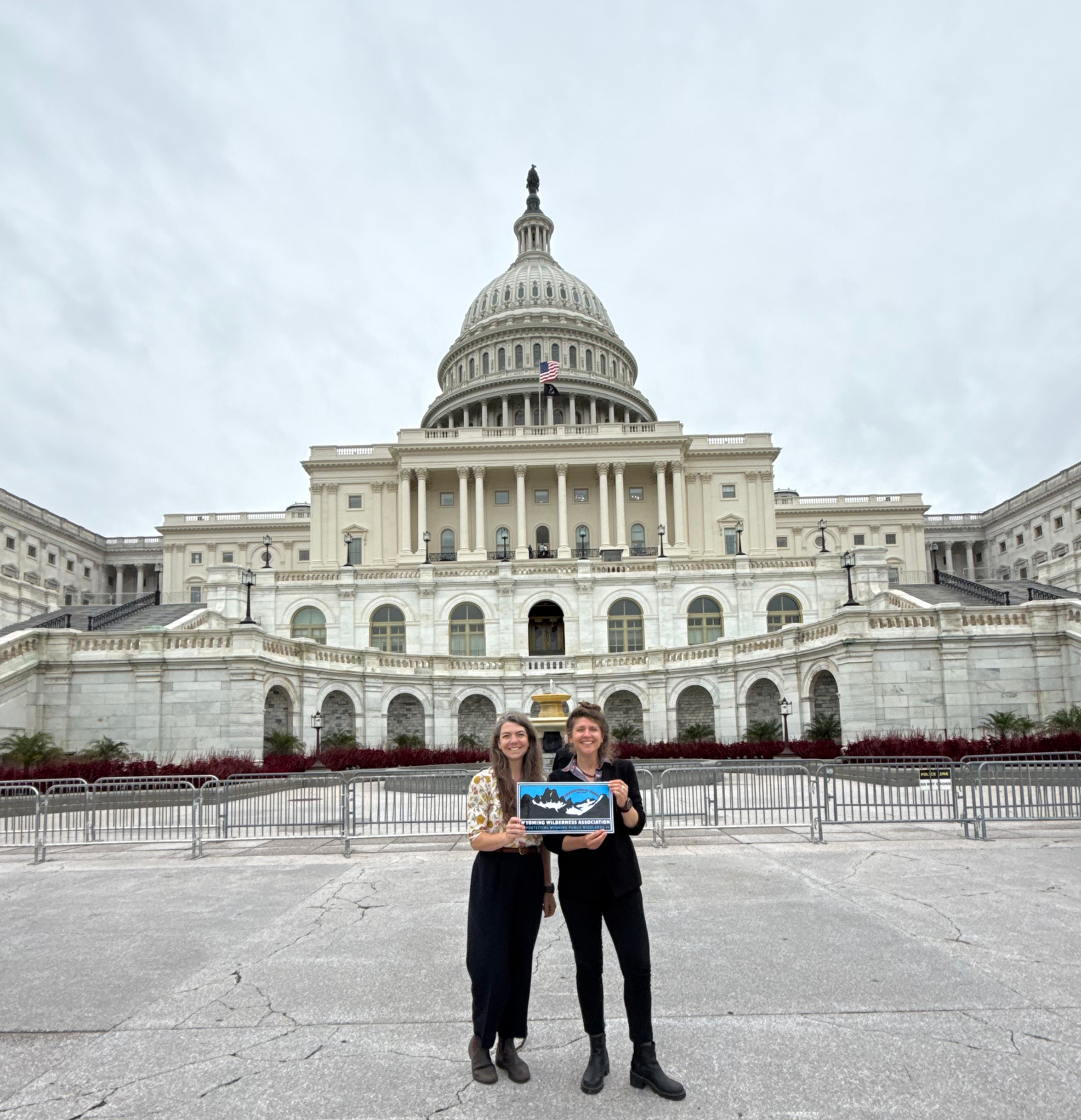 Jennie Mans & Peggie dePasqualie fly the WWA colors at the US Capitol